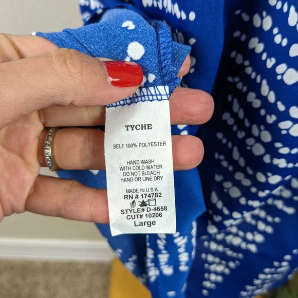 Get 2 dresses for the price of 1! Fab'rik Printed Halter Keyhole Dresses L. - Picture 7 of 15